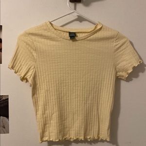 yellow shirt with lettuce  trimming